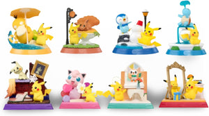 A set of eight colorful Pikachu-themed figurines arranged in two rows on a plain white background. Each figure is posed in a different scene with its own base, including an umbrella scene, a picnic, a snowman, a beach cabana, a desk, a pink bear hug, a painting studio, and a mirror scene.